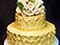 Golden Wedding Cake with roses